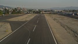 5K aerial stock footage of runway at Whiteman Airport while landing, Pacoima, California, sunset Aerial Stock Footage | AX0017_120