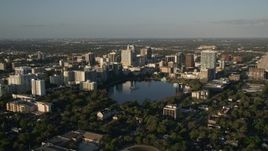 5K aerial stock footage approach Downtown Orlando at sunrise, Florida Aerial Stock Footage | AX0018_001E