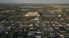 5K aerial stock footage tilt up from neighborhood, reveal Citrus Bowl in Orlando, Florida at Sunrise Aerial Stock Footage | AX0018_008E