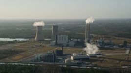 5K aerial stock footage approach Stanton Energy Center power plant in Orlando at sunrise, Florida Aerial Stock Footage | AX0018_027