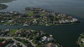 5K aerial stock footage fly over waterfront homes on the Indian River in Melbourne Beach, Florida Aerial Stock Footage | AX0018_084E