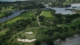 5K aerial stock footage flyby Jupiter Island Golf Club in Hobe Sound, Florida Aerial Stock Footage | AX0019_018E