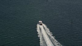 5K aerial stock footage of tracking a speedboat cruising across Biscayne Bay, Florida Aerial Stock Footage | AX0020_006E