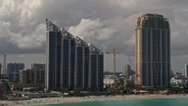 5K aerial stock footage of oceanfront condominium high-rise and resort hotel in Sunny Isles Beach, Florida Aerial Stock Footage | AX0020_078