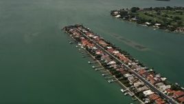 5K aerial stock footage fly over island waterfront homes on Biscayne Point, Florida Aerial Stock Footage | AX0020_099