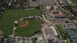 5K aerial stock footage of baseball and soccer fields at Barry University, Miami Shores, Florida Aerial Stock Footage | AX0020_106