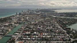 5K aerial stock footage tilt from Surfside neighborhoods to reveal Biscayne Point and Miami Beach, Florida Aerial Stock Footage | AX0021_017E