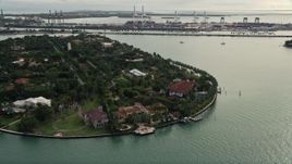 5K aerial stock footage of waterfront mansions on Star Island, Florida Aerial Stock Footage | AX0021_074