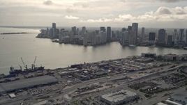 5K aerial stock footage of Downtown Miami skyline seen from the Port of Miami, Florida Aerial Stock Footage | AX0021_077