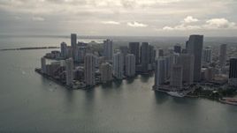 5K aerial stock footage tilt from Port of Miami to reveal and approach Downtown Miami, Florida Aerial Stock Footage | AX0021_078E