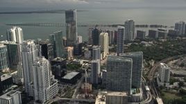 5K aerial stock footage of Downtown Miami skyscrapers around the Four Seasons Hotel high-rise, Florida Aerial Stock Footage | AX0021_082E