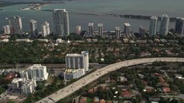 5K aerial stock footage of Interstate 95 near waterfront condos in Downtown Miami, Florida Aerial Stock Footage | AX0021_084