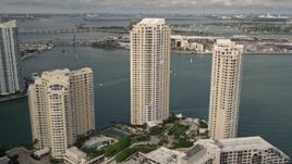 5K aerial stock footage of waterfront skyscrapers on the shore of Brickell Key, Downtown Miami, Florida Aerial Stock Footage | AX0021_122