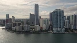 5K aerial stock footage of bayfront skyscrapers on the shore of Downtown Miami, Florida Aerial Stock Footage | AX0021_123E