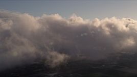 5K aerial stock footage of a thick layer of clouds over Kendall at sunset in Florida Aerial Stock Footage | AX0022_002