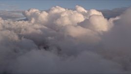 5K aerial stock footage approach thick bank of clouds over Miami at sunset in Florida Aerial Stock Footage | AX0022_004E