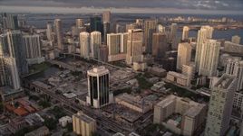 5K aerial stock footage approach skyscrapers in Downtown Miami at sunset, Florida Aerial Stock Footage | AX0022_028E