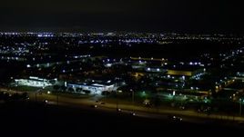 5K aerial stock footage approach shops and gas stations at night in Kendall, Florida Aerial Stock Footage | AX0023_002