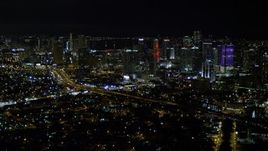 5K aerial stock footage approach the Downtown Miami skyline at night, Florida Aerial Stock Footage | AX0023_006