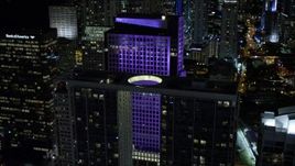 5K aerial stock footage of approaching 500 Brickell and Brickell World Plaza at night in Downtown Miami, Florida Aerial Stock Footage | AX0023_028E