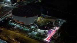 5K aerial stock footage of American Airlines Arena at night in Downtown Miami, Florida Aerial Stock Footage | AX0023_042E