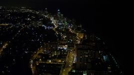 5K aerial stock footage of busy streets through Miami Beach at nighttime, Florida Aerial Stock Footage | AX0023_081E