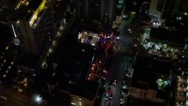 5K aerial stock footage of Bancroft Hotel at night in South Beach, Florida Aerial Stock Footage | AX0023_118E