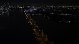 5K aerial stock footage of approaching the MacArthur Causeway with light traffic at night in Miami, Florida Aerial Stock Footage | AX0023_127E