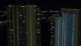 5K aerial stock footage flyby 900 Biscayne Bay and MarinaBlue at night in Downtown Miami, Florida Aerial Stock Footage | AX0023_144