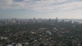 5K aerial stock footage fly over neighborhoods, reveal Downtown Miami skyline, Coconut Grove, Florida Aerial Stock Footage | AX0024_025E
