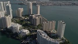 5K aerial stock footage fly over Mandarin Oriental to Brickell Key condos, Downtown Miami, Florida Aerial Stock Footage | AX0024_061E