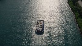 5K aerial stock footage of approaching ferry sailing on Government Cut, tilt down, Miami Beach, Florida Aerial Stock Footage | AX0024_072