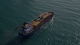 5K aerial stock footage of approaching a cargo ship sailing on Government Cut, Miami Beach, Florida Aerial Stock Footage | AX0024_074