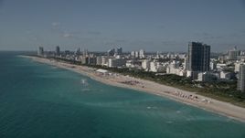 5K aerial stock footage of flying by hotels by the beach, South Beach, Miami Beach, Florida Aerial Stock Footage | AX0024_092