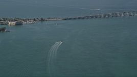 5K aerial stock footage of approaching speedboat in Biscayne Bay, Miami, Florida Aerial Stock Footage | AX0024_118