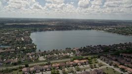 5K aerial stock footage video of flying over homes in Three Lakes, Miami, Florida Aerial Stock Footage | AX0025_001