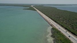5K aerial stock footage of light traffic on Overseas Highway, Key Largo, Florida Aerial Stock Footage | AX0025_050