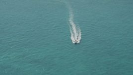 5K aerial stock footage approach speedboat near Overseas Highway, Conch Key, Marathon, Florida Aerial Stock Footage | AX0025_144
