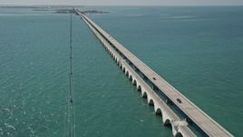 5K aerial stock footage of following Overseas Highway to Conch Key, Marathon, Florida Aerial Stock Footage | AX0025_145E