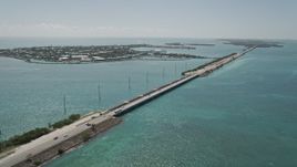 5K aerial stock footage of following Overseas Highway by Duck Key, Marathon, Florida Aerial Stock Footage | AX0025_149