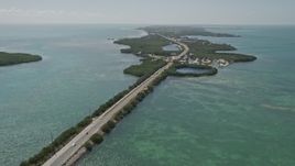 5K aerial stock footage of flying by Overseas Highway, pan right to reveal Grassy Key, Marathon, Florida Aerial Stock Footage | AX0025_151E