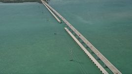 5K aerial stock footage follow Overseas Highway over Ramrod Key, approach Summerland Key, Florida Aerial Stock Footage | AX0026_054E
