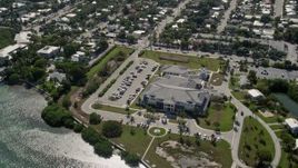 5K aerial stock footage of approaching Key West VA Outpatient Clinic, Key West, Florida Aerial Stock Footage | AX0026_060