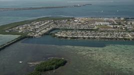 5K aerial stock footage of approaching military housing on Sigsbee Park shore, Key West, Florida Aerial Stock Footage | AX0026_063