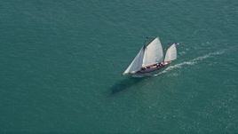 5K aerial stock footage of a sailboat on the ocean near Key West, Florida Aerial Stock Footage | AX0026_075