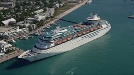 5K aerial stock footage of flying by Royal Caribbean Cruise Ship in Key West, Florida Aerial Stock Footage | AX0026_077