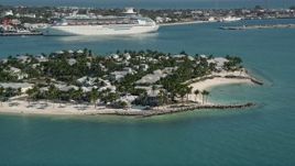 5K aerial stock footage of flying by homes and beaches, Sunset Key, Key West, Florida Aerial Stock Footage | AX0026_092