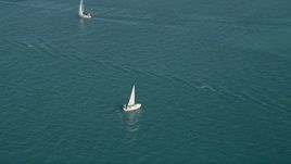 5K aerial stock footage of a sailboat on the water near Key West, Florida Aerial Stock Footage | AX0026_095