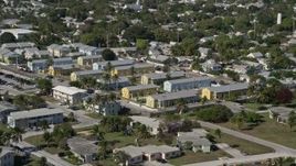 5K aerial stock footage of flying by barracks at NAS Key West Truman Annex, Key West, Florida Aerial Stock Footage | AX0026_112