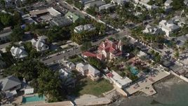 5K aerial stock footage of flying by the Southernmost House Historic Inn, Key West, Florida Aerial Stock Footage | AX0027_010